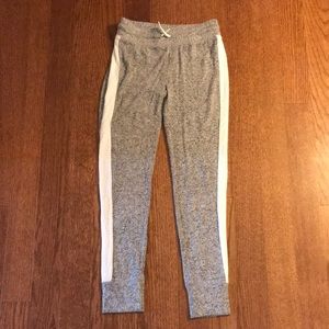 A gray pair of leggings for a young girl.